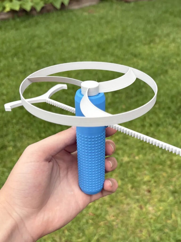 Lanzador De Disco Volador Freesbee Juguete Niños Celeste