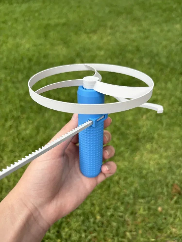 Lanzador De Disco Volador Freesbee Juguete Niños Celeste - Imagen 2